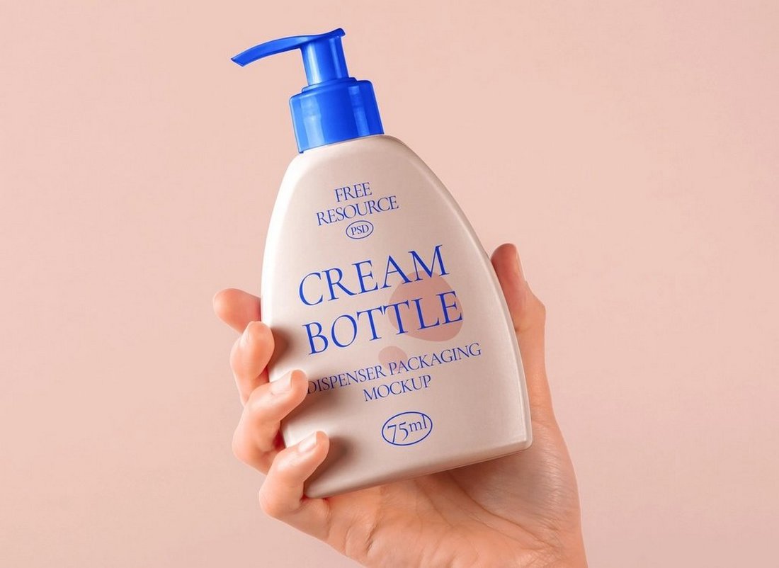 Free Hand Holding Cosmetic Bottle Mockup