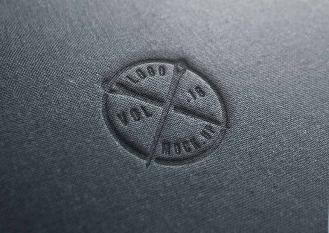 Free Linen Embossed Logo Mockup